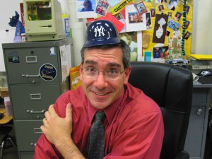 Sean McKnight wears his favorite team's mini baseball helmet.