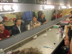 Cast Members of "Check Please" get made up, during dress rehearsal.