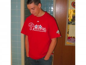 With a sad face, Taylor Groff hangs his head after the Phillies' loss in the World Series