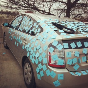 Senior Dave Glick has used sticky notes to tease senior Emily Adams about parking incorrectly before. The same method was ideal to ask Adams to prom. 