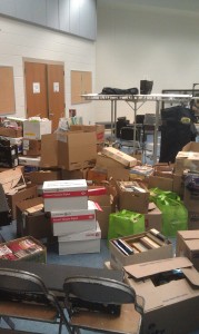 Thousands of books are being stored in the band room in preparation for this weekend's book sale. (Photo by Devon Reis)