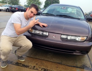 Senior Mike Eshleman is very attached to his car. (Photo by Grant Houck)