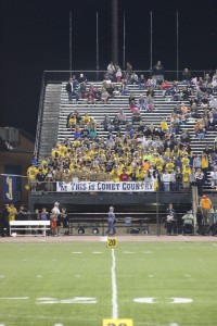 The student section supports the Comets against Hempfield.  