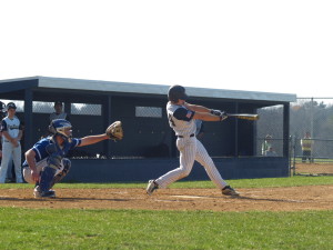 Collin Whiteside takes a solid cut on March 24. (Photo by Brian Markley)