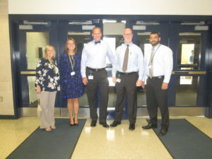 The high school principals will try looping for at least the next two years. From left to right are Mrs. Marsh, Ms. O'Connor, Dr. Gale, Dr. D'Amico and Mr. Eby. 